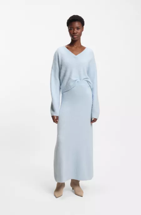 Knitted skirt with logo charm