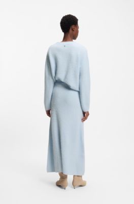 Jupe en maille avec breloque logot&eacute;e, bleu clair