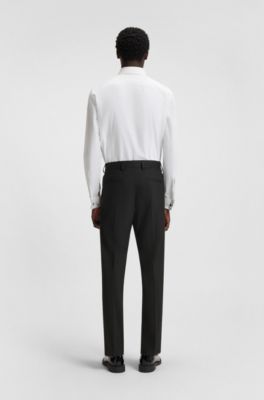 Pantalones modern fit de tejido dobby el&aacute;stico, Negro