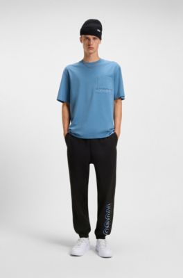 Ombr&eacute;-logo tracksuit bottoms in cotton terry, Black