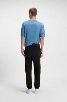 Pantalones de ch&aacute;ndal en felpa de algod&oacute;n con bordado de logo sombreado, Negro