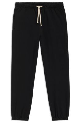 BECKHAM x BOSS relaxed tracksuit bottoms in cotton terry, Black