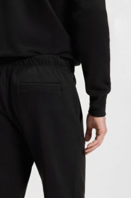 Pantalones de ch&aacute;ndal BECKHAM x BOSS en felpa de algod&oacute;n, Negro