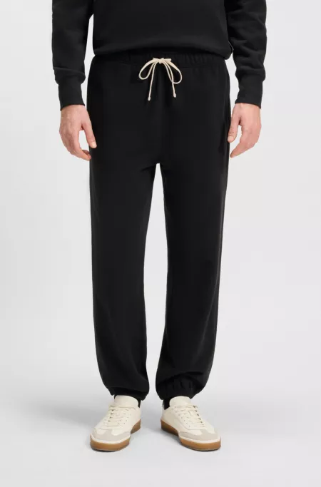 BECKHAM x BOSS relaxed tracksuit bottoms in cotton terry