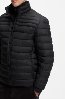 Chaqueta acolchada repelente al agua plegable con insignia de logo, Negro