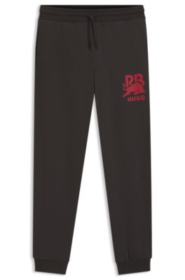 HUGO x RB bull-graphic tracksuit bottoms in cotton terry, Dark Brown