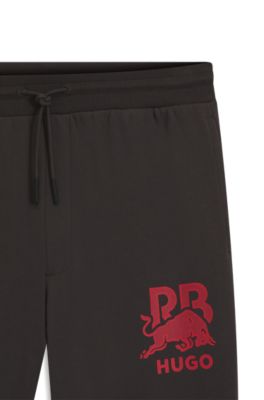 HUGO x RB bull-graphic tracksuit bottoms in cotton terry, Dark Brown