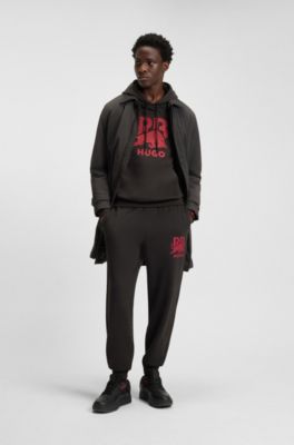 HUGO x RB bull-graphic tracksuit bottoms in cotton terry, Dark Brown