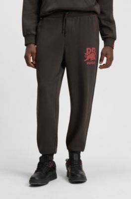 HUGO x RB bull-graphic tracksuit bottoms in cotton terry, Dark Brown