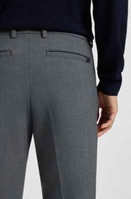 Pantalones slim fit en tejido dobby el&aacute;stico antimanchas, Gris