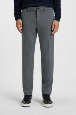 Pantalones slim fit en tejido dobby el&aacute;stico antimanchas, Gris