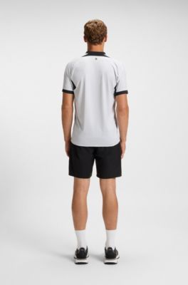 Polo slim fit en punto de malla con cuello con cremallera, Blanco