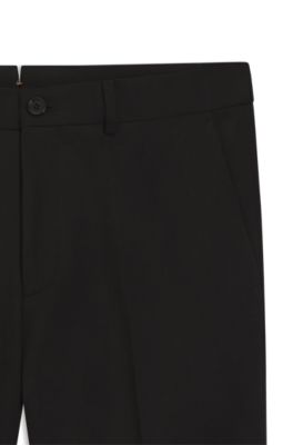 Pantalones slim fit de algod&oacute;n, cachemira y el&aacute;stico, Negro