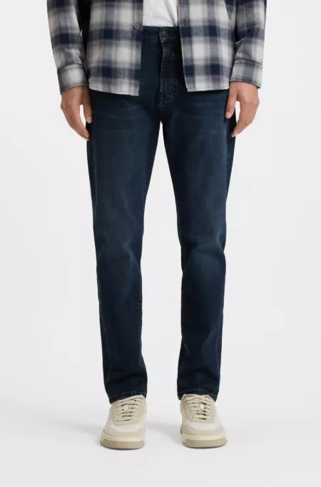 Blue tapered-fit jeans in soft-motion denim