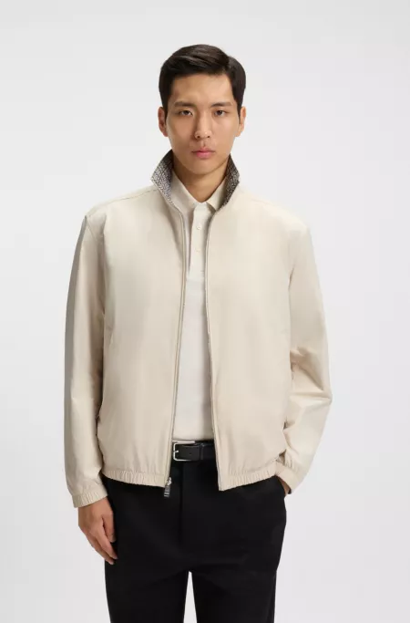 Reversible checked jacket with water-repellent finish