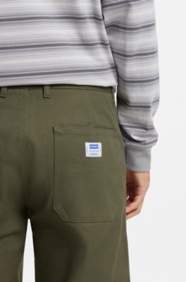 Pantalones regular fit de lona de algod&oacute;n el&aacute;stico, Cal