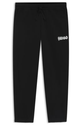 Logo-print tracksuit bottoms in cotton terry, Black