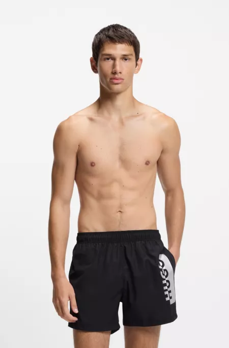 Swim shorts with metallic split logo