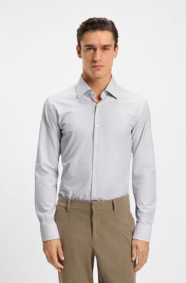Camisa slim fit en tejido el&aacute;stico t&eacute;cnico a rayas, Marr&oacute;n claro