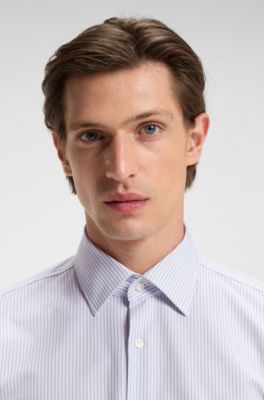 Camisa slim fit en tejido el&aacute;stico t&eacute;cnico a rayas, Celeste
