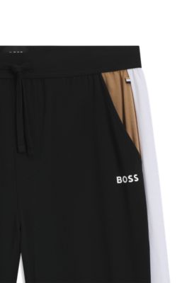 Pantalones de pijama de algod&oacute;n con paneles en contraste, Negro