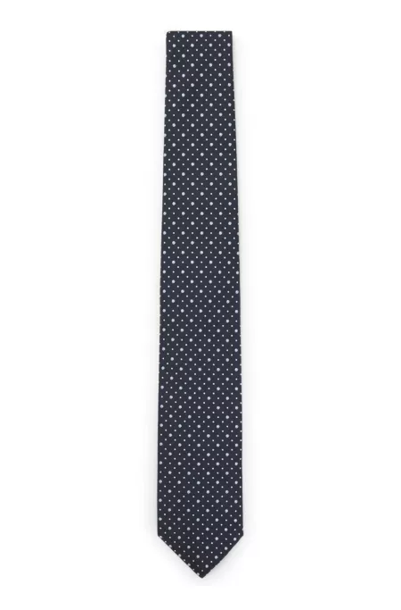 Dot-motif tie in a silk blend