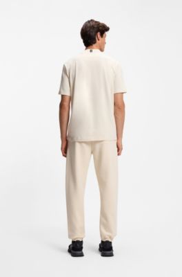 Camiseta relaxed fit de algod&oacute;n el&aacute;stico con logo en el cuello, Blanco