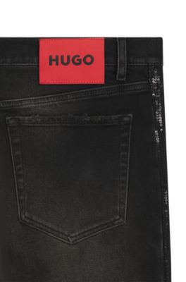 Jeans tapered fit de denim el&aacute;stico gris, Gris oscuro
