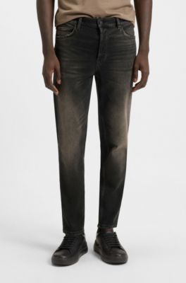 Jeans tapered fit de denim el&aacute;stico gris, Gris oscuro