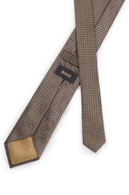 Corbata de jacquard de seda confeccionada en Italia, Marr&oacute;n