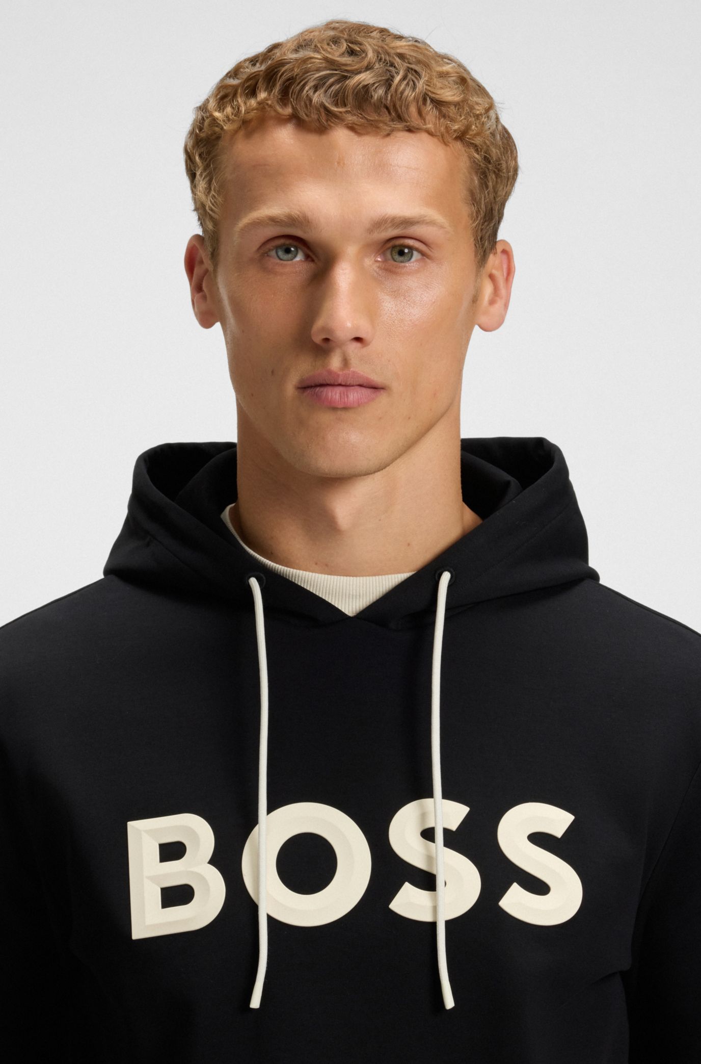 BOSS - Moulded-logo hoodie in a cotton blend - Black