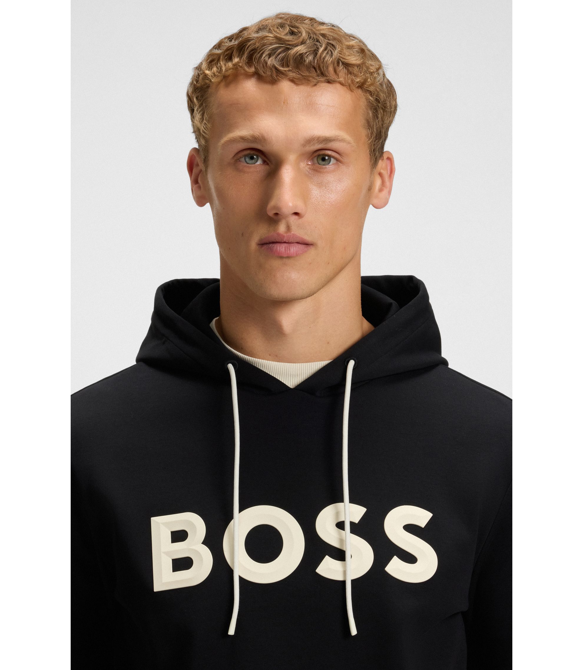 BOSS - Moulded-logo hoodie in a cotton blend - Black