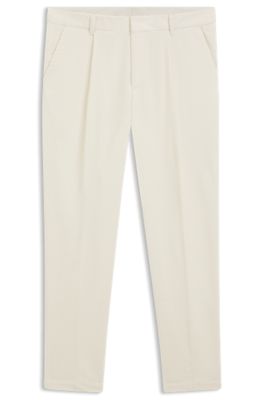 Pantalones tapered fit en pana de algod&oacute;n el&aacute;stico, Blanco