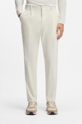 Pantalones tapered fit en pana de algod&oacute;n el&aacute;stico, Blanco