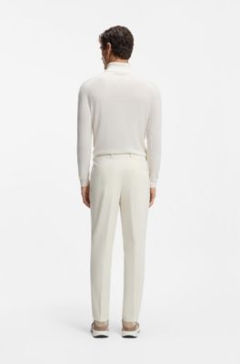 Pantalones tapered fit en pana de algod&oacute;n el&aacute;stico, Blanco