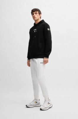 Sudadera con capucha de algod&oacute;n con dise&ntilde;o de tenis, Negro
