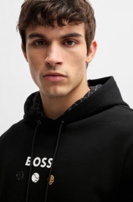 Sudadera con capucha de algod&oacute;n con dise&ntilde;o de tenis, Negro