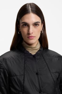 Veste pliable en tissu brillant d&eacute;perlant, Noir
