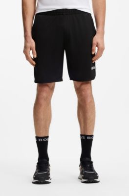 Active Shorts de secado r&aacute;pido en tejido el&aacute;stico con bolsillos amplios, Negro