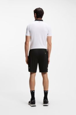 Active Shorts de secado r&aacute;pido en tejido el&aacute;stico con bolsillos amplios, Negro