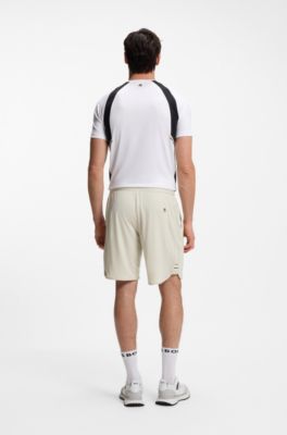 Shorts de secado r&aacute;pido en tejido el&aacute;stico con bolsillos amplios, Beige claro