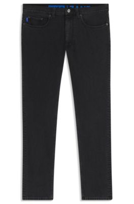 Jeans skinny fit en denim lavado con grano negro, Negro