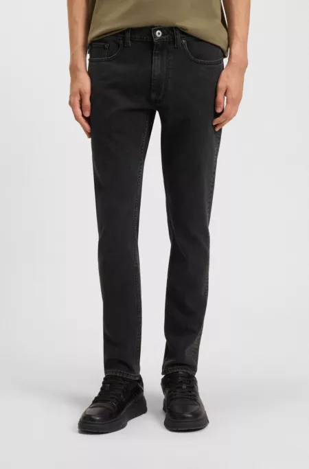 Black skinny-fit jeans in grain-washed denim