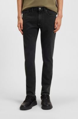 Jeans skinny fit en denim lavado con grano negro, Negro