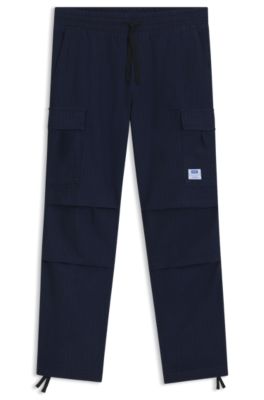 Pantalones cargo relaxed fit en tejido antidesgarros de aspecto denim, Azul oscuro