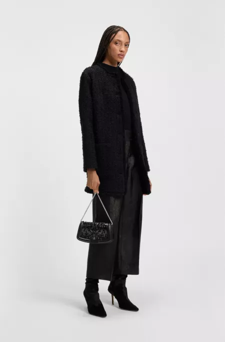 Ariell clutch bag with sequin embellishments