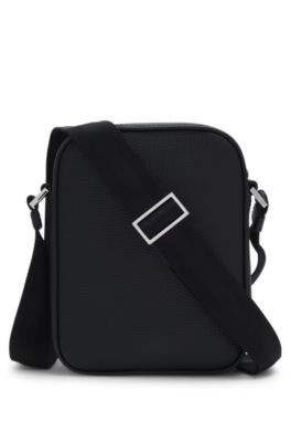 Reporter bag in textured and plain leather, Black