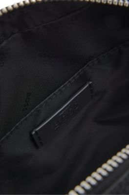 Reporter bag in textured and plain leather, Black