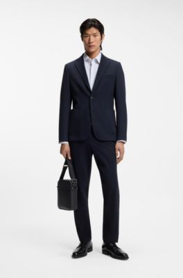 Reporter bag in textured and plain leather, Black