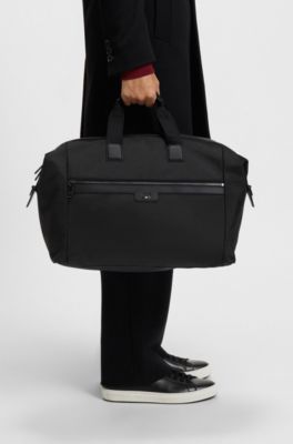 Bolsa de viaje de tejido con textura y apliques de piel sint&eacute;tica, Negro